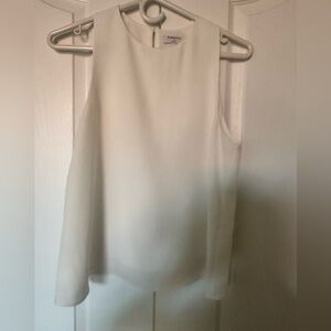 Whit classic Babaton top .